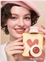 رژلب کاسه ای جیبی شیگلم مدل Bounce Putty رنگ Peachy Pie